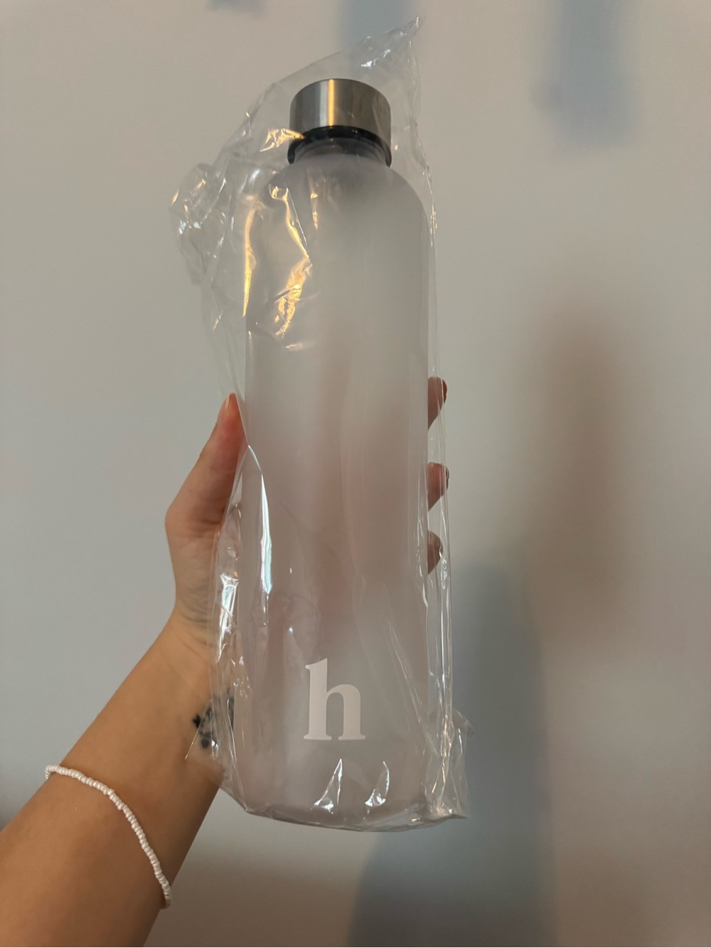 here Matte Frosted Pink Reusable Water Bottle wit Silver Cap